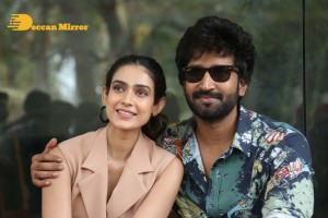 Akanksha Singh and Aadhi Pinisetty pose for pictures during the press meet of the movie Clap