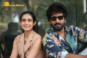 Akanksha Singh and Aadhi Pinisetty pose for pictures during the press meet of the movie Clap