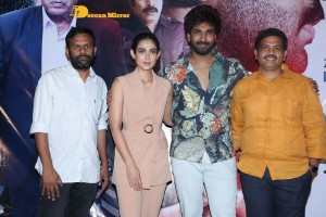 Akanksha Singh and Aadhi Pinisetty pose for pictures during the press meet of the movie Clap