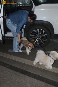 Indian model and actress Daisy Shah in a blue shirt and jeans at mumbai airport