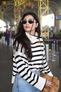 actress Daisy Shah cute at mumbai airport in a striped t-shirt