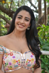 actress daksha nagarkar in a low neck shoulderless dress