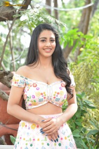 actress daksha nagarkar in a low neck shoulderless dress