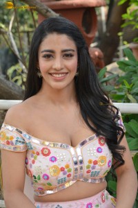actress daksha nagarkar in a low neck shoulderless dress