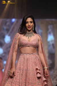 actress Daksha Nagarkar ramp walk in a lehenga choli