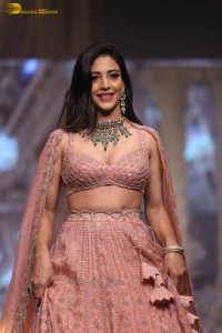 actress Daksha Nagarkar ramp walk in a lehenga choli