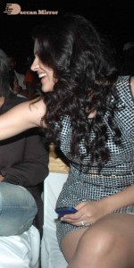 Actress Deeksha Seth dressed in black and white attending a cinema event