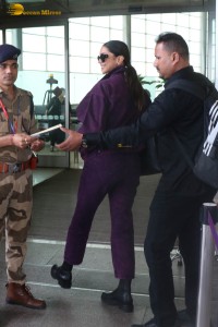 actress deepika padukone dressed in blue velvet at airport