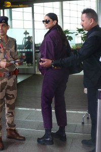 actress deepika padukone dressed in blue velvet at airport