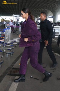 actress deepika padukone dressed in blue velvet at airport