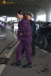 actress deepika padukone dressed in blue velvet at airport