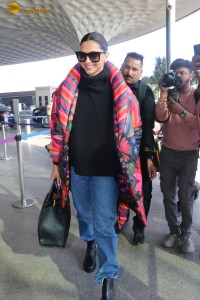 actress deepika padukone shows off fashion apparel at mumbai airport while traveling