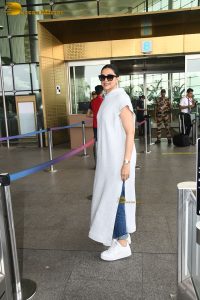 Bollywood actress Deepika Padukone in a white dress