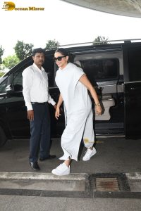 Bollywood actress Deepika Padukone in a white dress