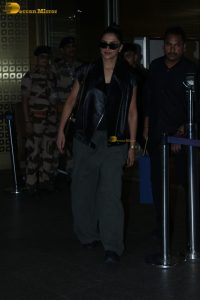 bollywood actress Deepika Padukone stylish in sunglasses and black top