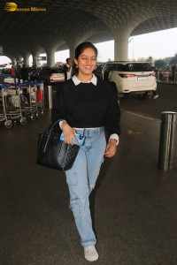 actress deepika singh in a blue sweater and denim jeans at airport