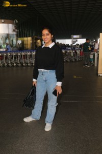 actress deepika singh in a blue sweater and denim jeans at airport