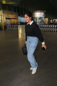 actress deepika singh in a blue sweater and denim jeans at airport