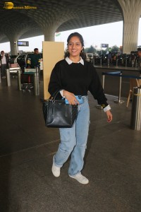 actress deepika singh in a blue sweater and denim jeans at airport