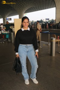 actress deepika singh in a blue sweater and denim jeans at airport