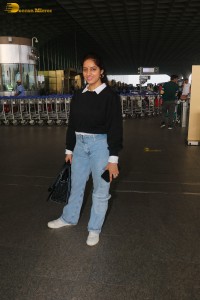 actress deepika singh in a blue sweater and denim jeans at airport