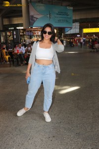 Indian tv actress deepika singh in a white top and denim jeans