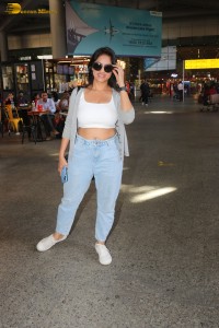 Indian tv actress deepika singh in a white top and denim jeans