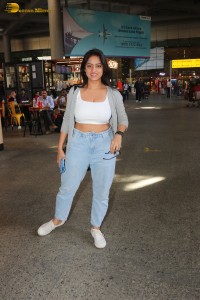Indian tv actress deepika singh in a white top and denim jeans