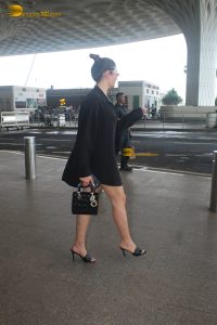 actress and singer Deepti Sadhwani gorgeous in a black shirt