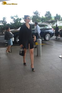 actress and singer Deepti Sadhwani gorgeous in a black shirt