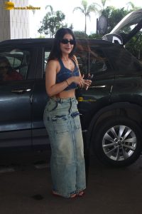 cute actress Dhanashree Verma in blue top and denim jeans