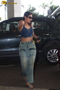 cute actress Dhanashree Verma in blue top and denim jeans