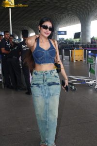 cute actress Dhanashree Verma in blue top and denim jeans