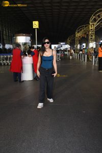 actress Dhanashree Verma pretty in a blue top at airport