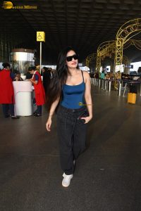 actress Dhanashree Verma pretty in a blue top at airport