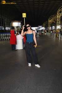 actress Dhanashree Verma pretty in a blue top at airport