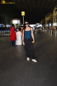 actress Dhanashree Verma pretty in a blue top at airport