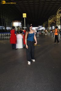 actress Dhanashree Verma pretty in a blue top at airport