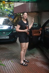 Indian Singer Dhvani Bhanushali in black t-shirt and shorts after workout