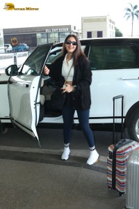Bollywood Singer Dhvani Bhanushali in white t-shirt seen traveling from Mumbai Airport