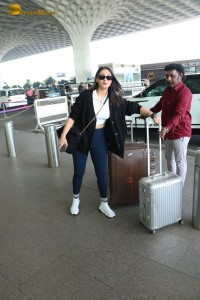 Bollywood Singer Dhvani Bhanushali in white t-shirt seen traveling from Mumbai Airport