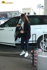 Bollywood Singer Dhvani Bhanushali in white t-shirt seen traveling from Mumbai Airport