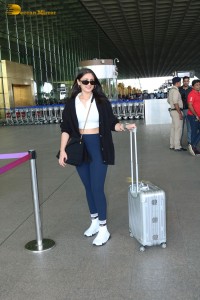 Bollywood Singer Dhvani Bhanushali in white t-shirt seen traveling from Mumbai Airport