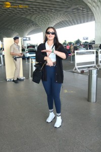 Bollywood Singer Dhvani Bhanushali in white t-shirt seen traveling from Mumbai Airport