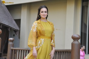 actress dia mirza beautiful photoshoot in a yellow dress
