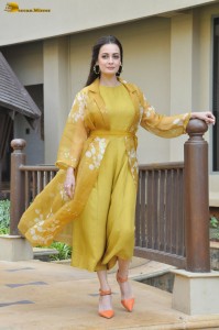 actress dia mirza beautiful photoshoot in a yellow dress