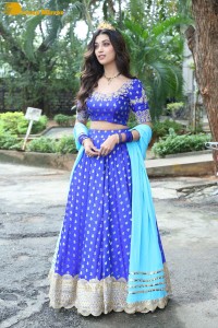 Actress Digangana Suryavanshi in a blue dress