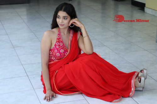 Telugu Actress Digangana Suryavanshi in a red saree