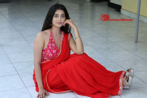 Telugu Actress Digangana Suryavanshi in a red saree