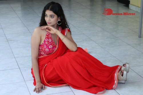 Telugu Actress Digangana Suryavanshi in a red saree